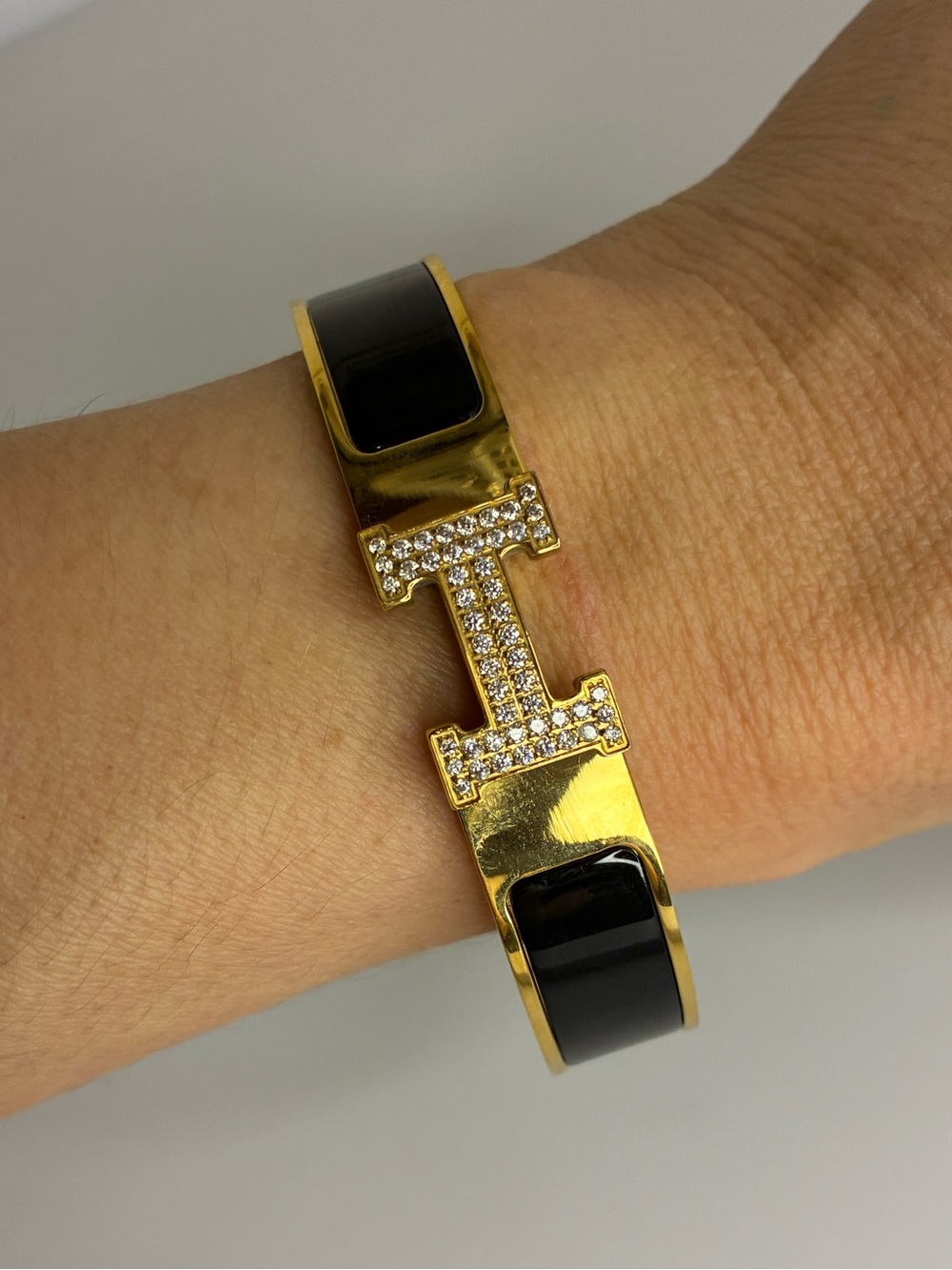 Vintage Gold Tone Cuff Bracelet with Black Enamel and Crystal 'H'